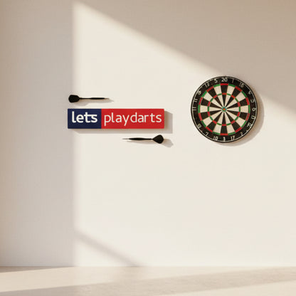 Dartboard with 'lets playdarts' sign on a plain background