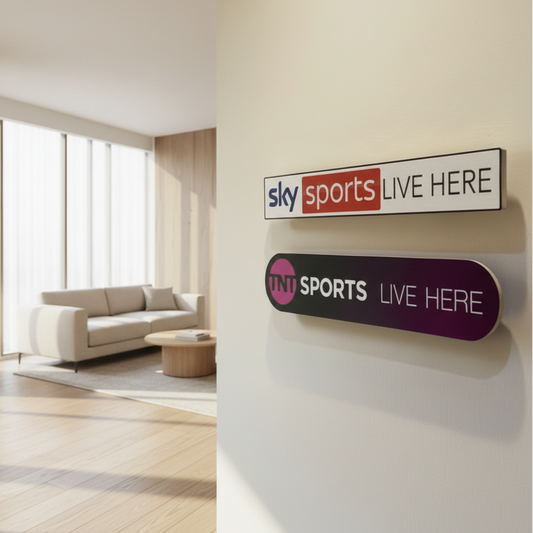 Two sports channel logos on a wall, one for Sky Sports and one for TNT Sports.